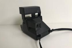 Polaroid Sun 660 Autofocus Instant Film Camera with Strap