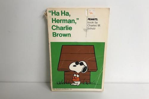 Ha Ha, Herman, Charlie Brown: A Peanuts Book | Softcover Book